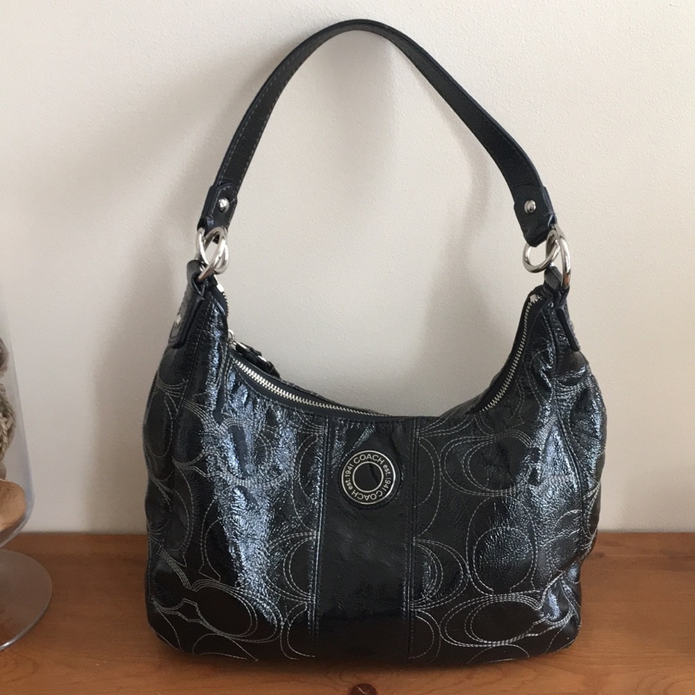 Coach black patent leather hobo bag.